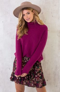 Col Trui Met Ruit Patroon Magenta