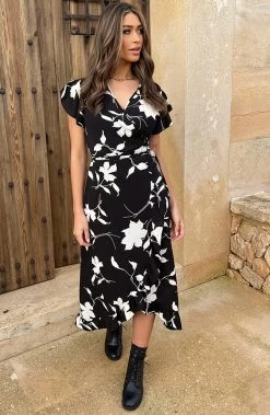 Flower Jurk Midi Zwart Wit -Kleding Promotie Winkel Midi Overslag Jurk Flower Zwart Wit 1 586x900 1